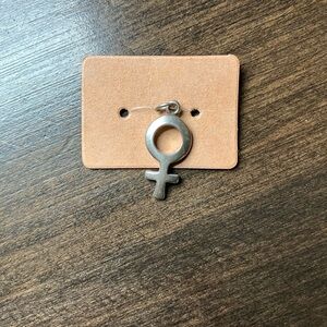 Feminist pendant or charm, sterling silver .925